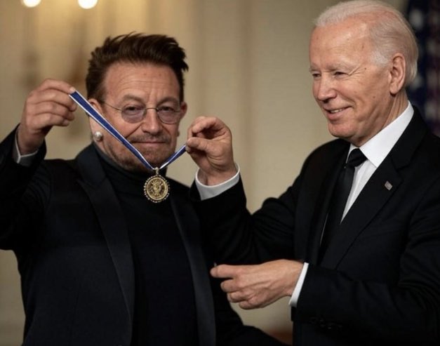berningman16's tweet photo. @U2 This goblin Bono is getting a medal? For what? Supporting Israel's murderous Genocide?

Be careful, Bono - that medal is dripping with blood. https://t.co/CzXKQcYSQA