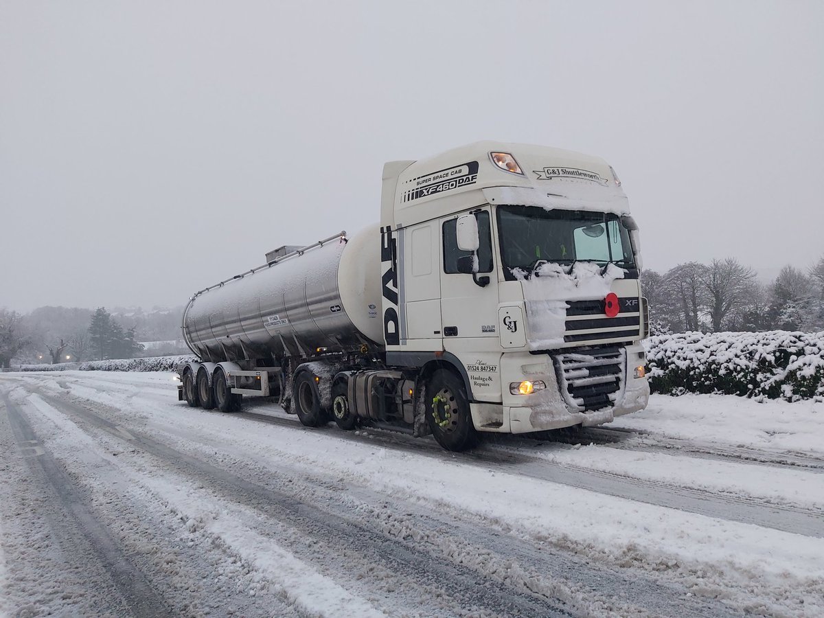 Trucks, hills and snow dont mix. Lpst traction taking a full load of milk up to a dairy near Huddersfield. Reversed to a better place for cars to get round and feet up, heater on and wait for a plough