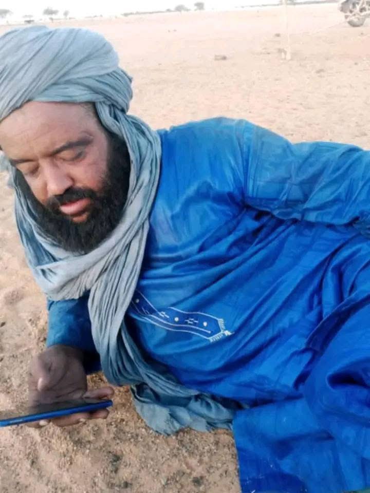 ZagazOlaMakama's tweet photo. Malian Armed Forces Apprehend Notorious Terrorist Mohamed Ould Elkehil in Djebock

The Malian Armed Forces (FAMa) have captured Mohamed Ould Elkehil, a veteran terrorist operative in the Sahel region, in a successful operation in Amasrakad, within the Djebock sector. The arrest marks a significant victory in the fight against extremism in the region.

Elkehil has been active in various terrorist organizations since 2012, including the Movement for Unity and Jihad in West Africa (MUJAO), the Islamic State in the Greater Sahara (EIGS), and the Coordination of Azawad Movements/High Council for Unity of Azawad (CMA/HCUA), which he recently left to rejoin EIGS.

Elkehil’s actions have left a trail of devastation, particularly in the Djebock sector. He is accused of causing the deaths of over 20 families and bearing responsibility for the deaths of numerous individuals, including Anara, a well-respected figure, Sidehame Ag Foukana, and Corporal Inawelane Ag Intassawalte of the Malian Army, among others.

Despite his infamy, Elkehil managed to evade capture for eight years, allegedly finding refuge in Algeria where he lived a quiet life while coordinating criminal activities.

The arrest has been widely celebrated across Mali, Libya, Algeria, and Niger, with thousands expressing gratitude toward the Malian Transitional President, General Assimi Goïta, and Defense Minister, General Sadio Camara.