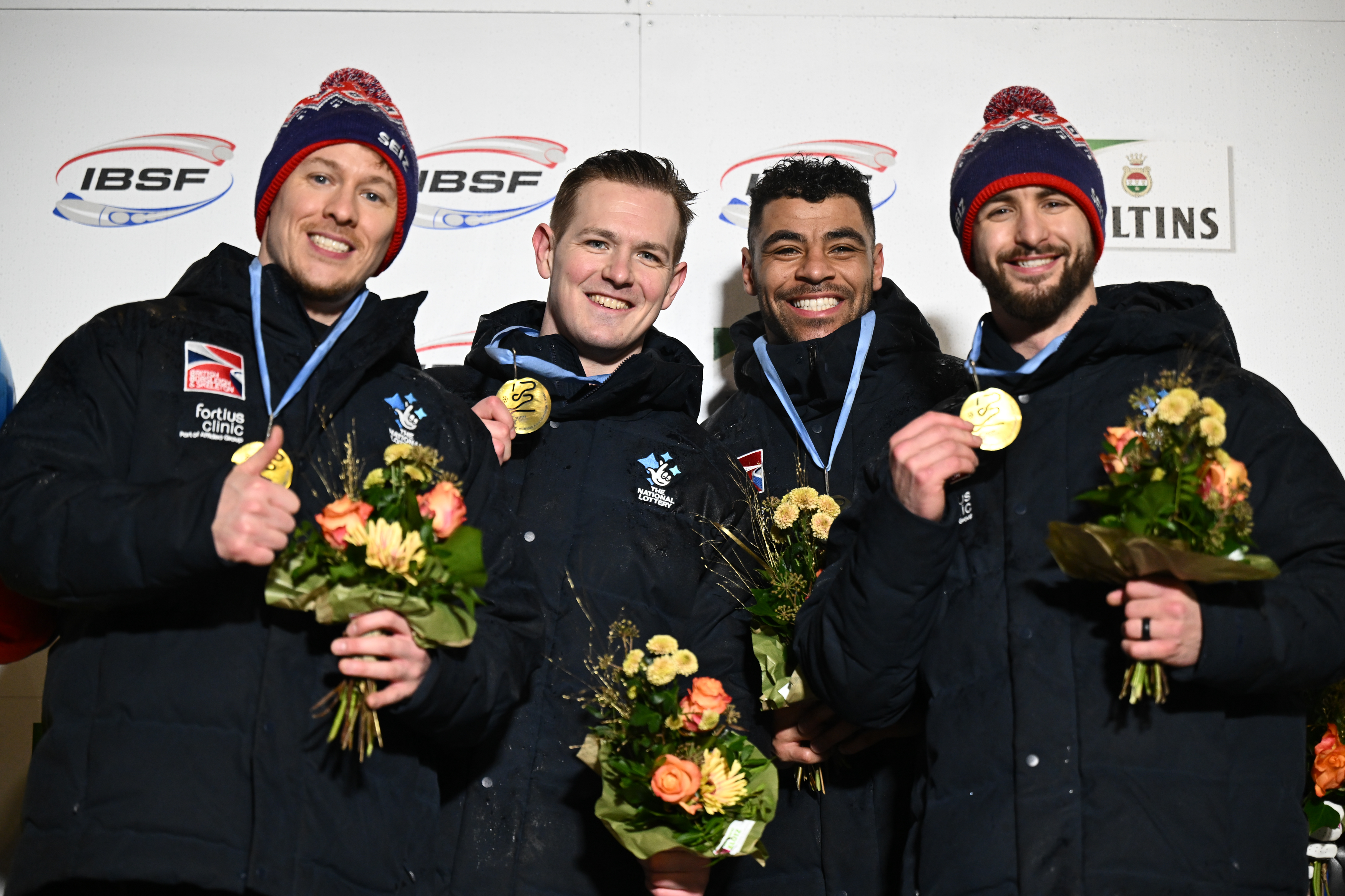 Le quatuor du Bobsleigh britannique médaillé d'or
