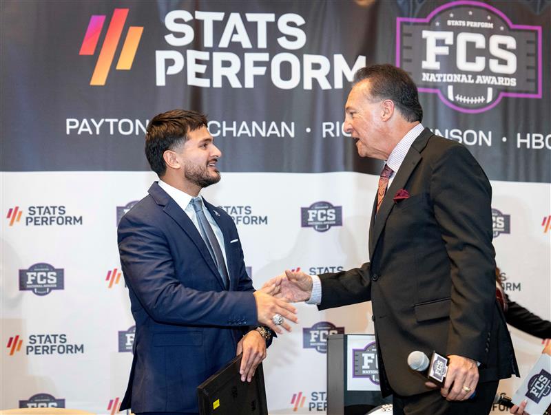 Stats Perform FCS National Awards

2024 FedEx Doris Robinson Scholar-Athlete of the Year Juan Velarde of North Carolina Central and awards master of ceremonies Gary Reasons.
