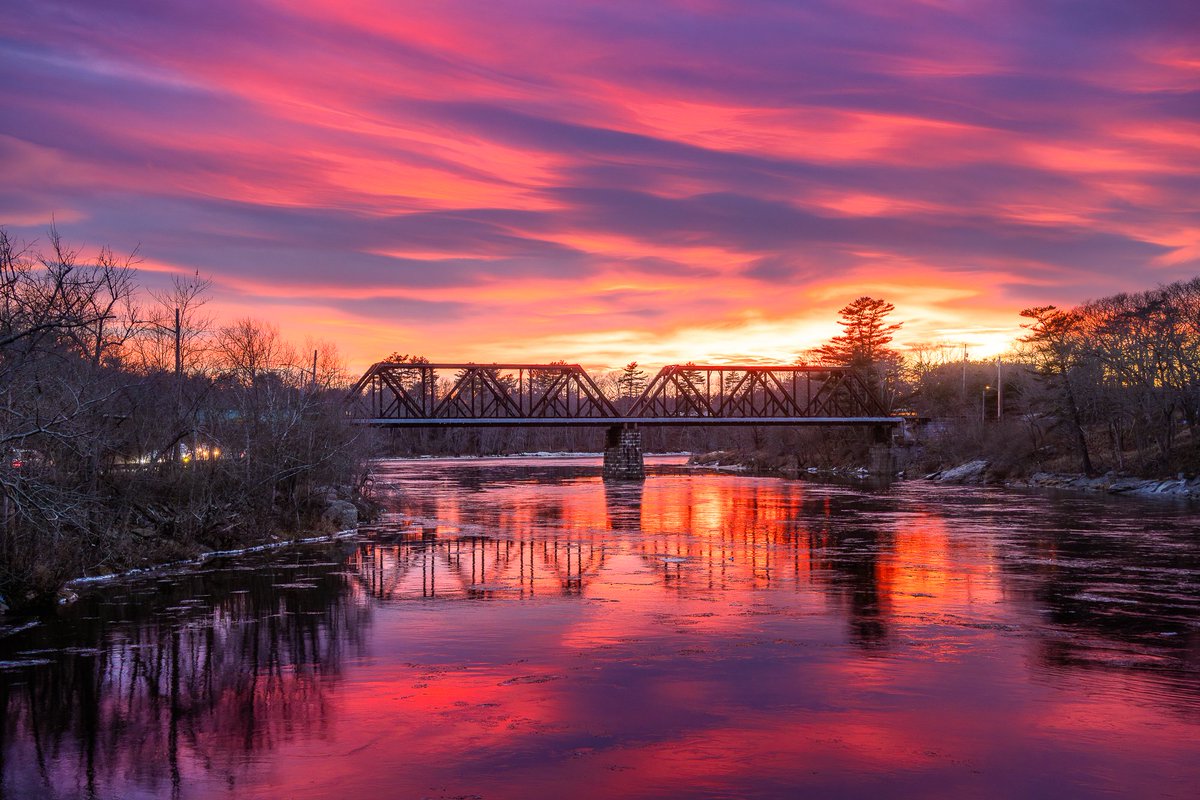 Excellent winter sunset in Brunswick, Maine last night. I pulled off of Route 1 at the Androscoggin Swinging Bridge, where I knew I would have a good view of it. Orographic lift from the White Mountains created these amazing clouds!