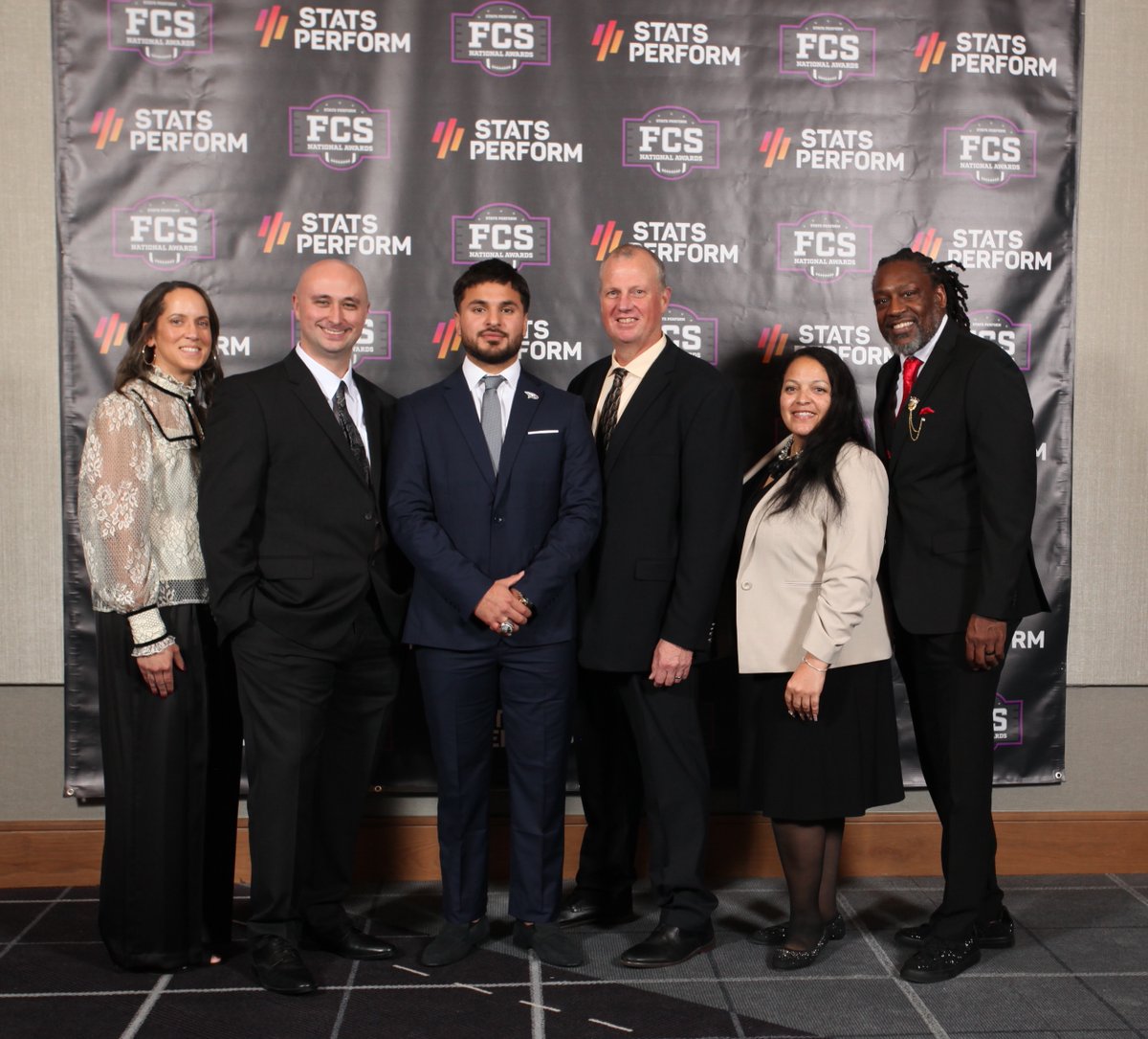 Stats Perform FCS National Awards

2024 FedEx Doris Robinson Scholar-Athlete Award recipient Juan Velarde (North Carolina Central), third from left, with the <a href="/FedEx/">FedEx</a> contingent.