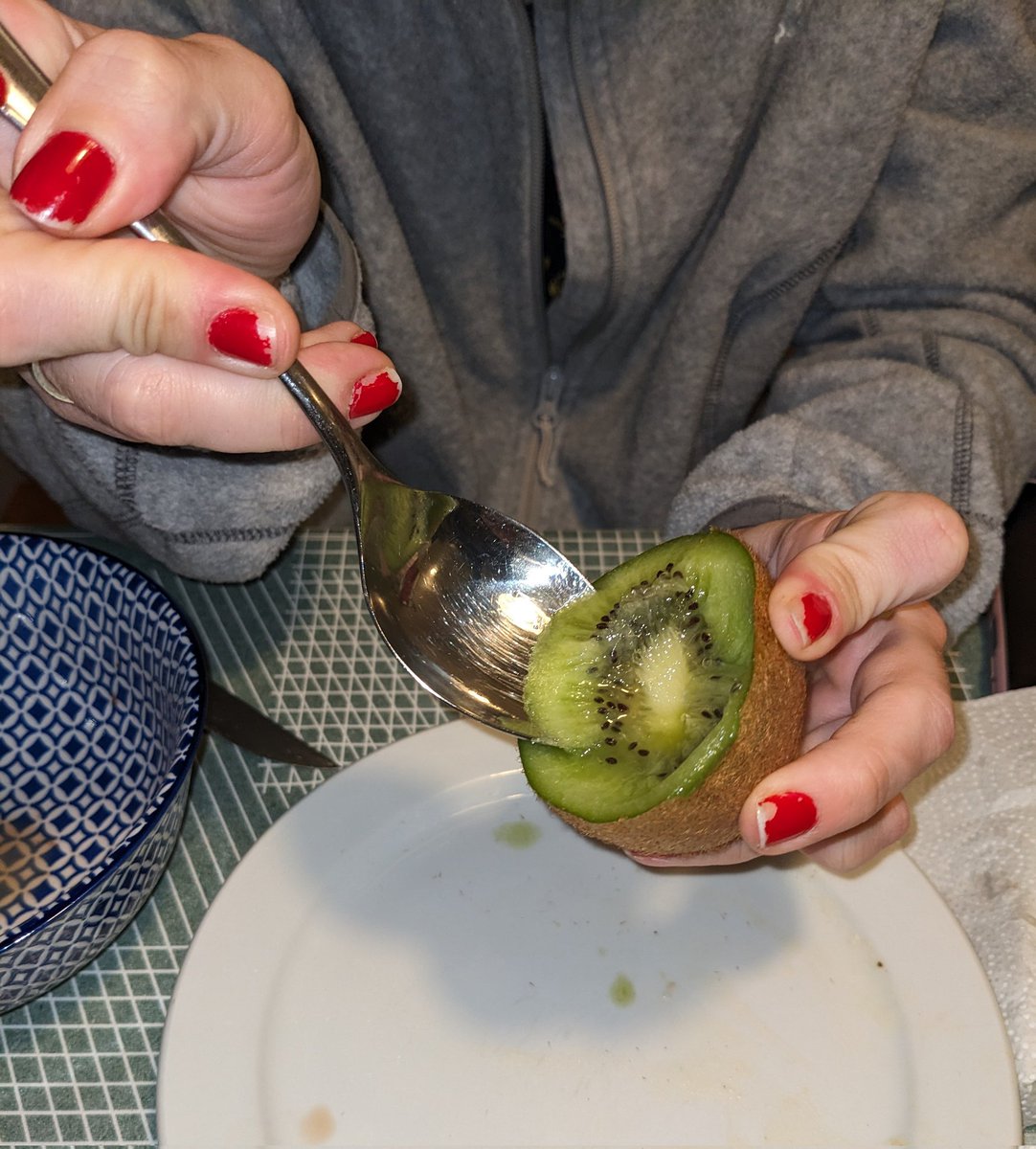 Eating the kiwi with the big spoon