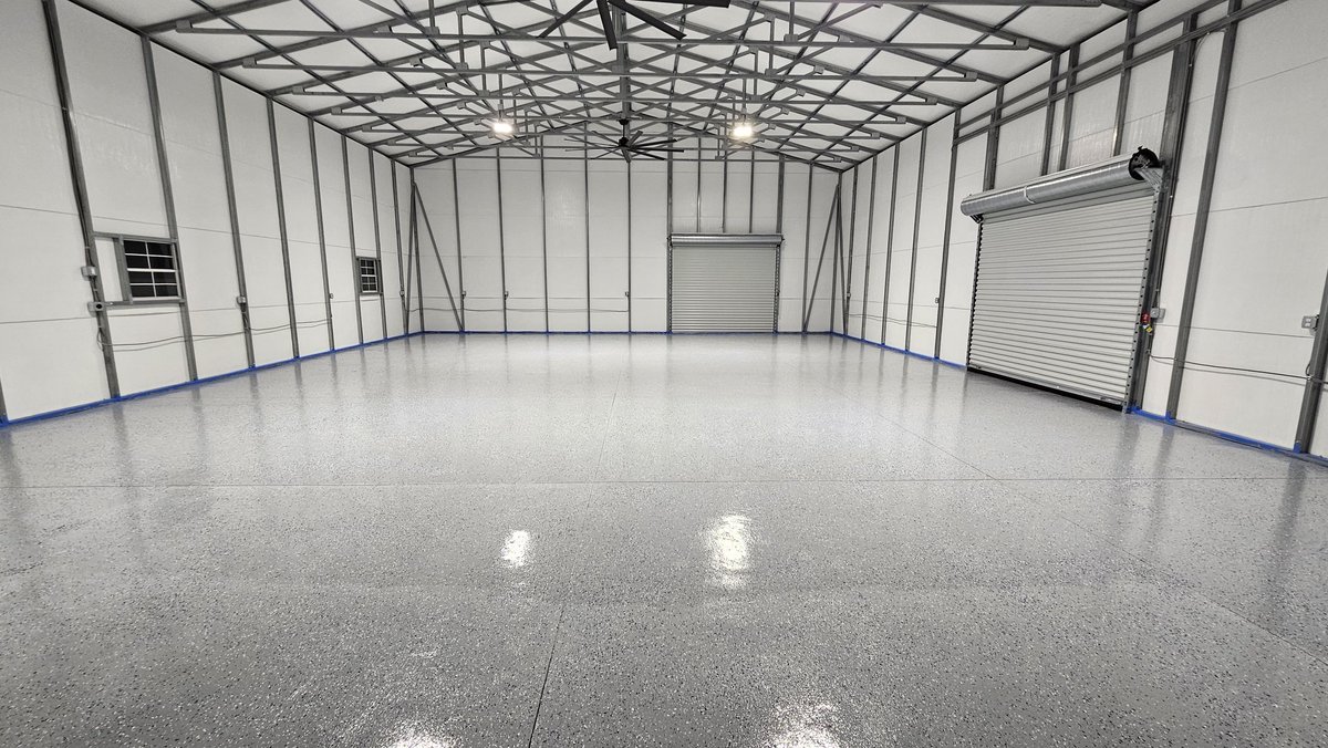 msande24's tweet photo. Spent the weekend exopying our 2000 sqft shop floor. I am already incredibly sore, but overall we're happy with the outcome ☺️ Never doing it again, though! #diy #NewYear2025 #shoplife https://t.co/icOK4PRMwp