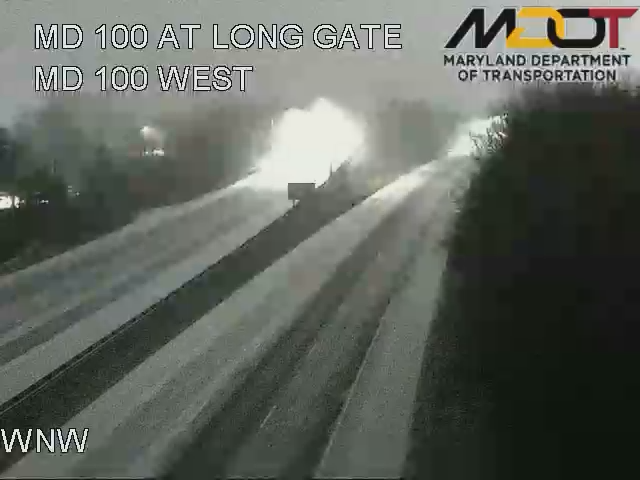 HoCoStudentNews's tweet photo. First signs of snow on roadways in Columbia and Ellicott City. Traffic cameras show light accumulation on major routes like MD 100 &amp; US 29. https://t.co/P12DLjqTuQ