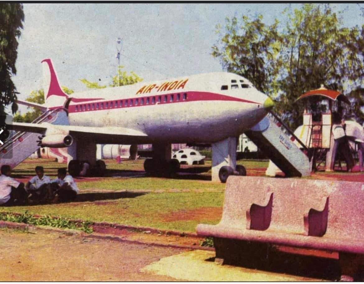 mumbaiheritage's tweet photo. How Many Remember This?

1960s: A concrete plane at Juhu Garden, Santacruz West

The Air-India Boeing 707 model stood proudly in Juhu Garden, also known as Nehru Park. It was a part of countless childhoods. 

Made of reinforced concrete, the plane depicted an Air-India Boeing 707-436. The cabin and flight deck had “seats” where kids could sit, pretending to fly high in the sky. It was more than a structure—it was an adventure.

Sadly, this iconic model met a tragic end. In March 2009, a piece of the plane fell off, fatally injuring a 9-year-old boy. By January 2011, the old airplane was scrapped and replaced with a modern version.

A piece of Bombay’s heritage, gone but never forgotten.
