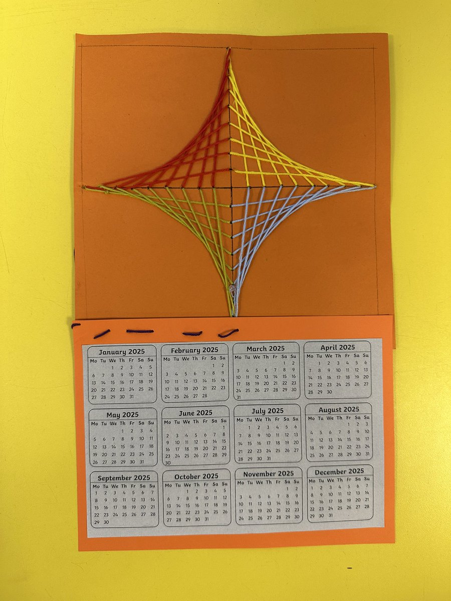 Sewing parabolic curves to create our new year calendars.