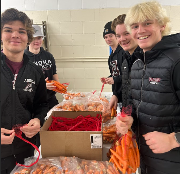 AHSchools's tweet photo. The holidays were brighter this season thanks to #AHSchools communities. Over 100 students from Anoka, Northdale & Roosevelt middle schools organized 13,000+ food items; Anoka Hockey prepared produce; McKinley Elementary fundraised $3,000+ for the cause: https://t.co/B9JnTg7qqG https://t.co/6sjWPFxbLv