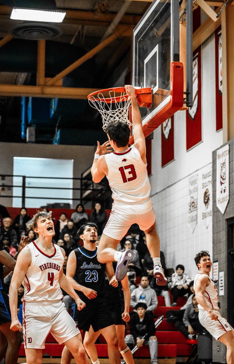Cool picture by Devils Lake student/DLJ photographer Noah Clooten tonight:

<a href="/OliverWirth13/">Oliver Wirth</a> hanging off the rim and <a href="/Joel_Nelson4/">Joel Nelson</a> and Mason Palmer reacting.