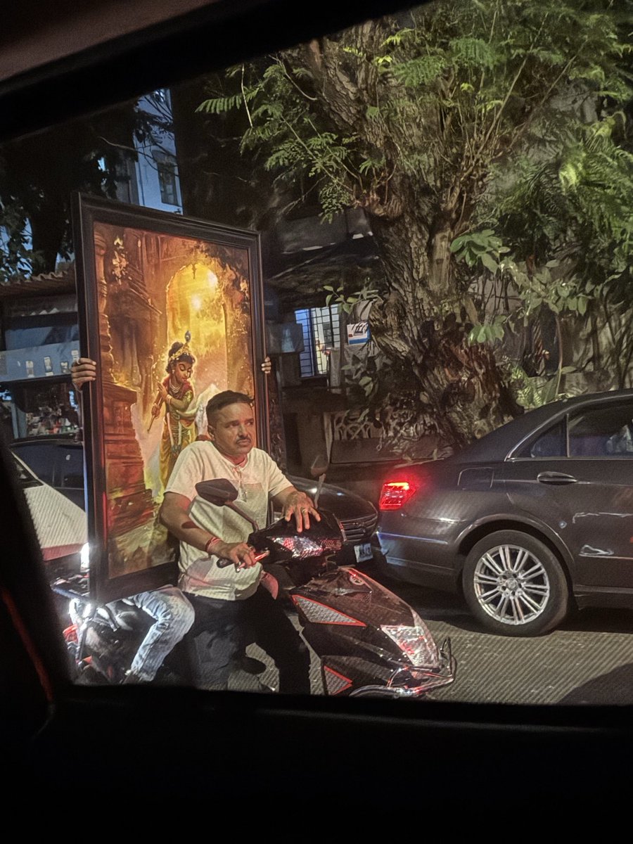 Was able to capture this shot in the nick of time at a traffic light…

The Gods are always looking over us…

(But it’s still better to have a helmet on…)