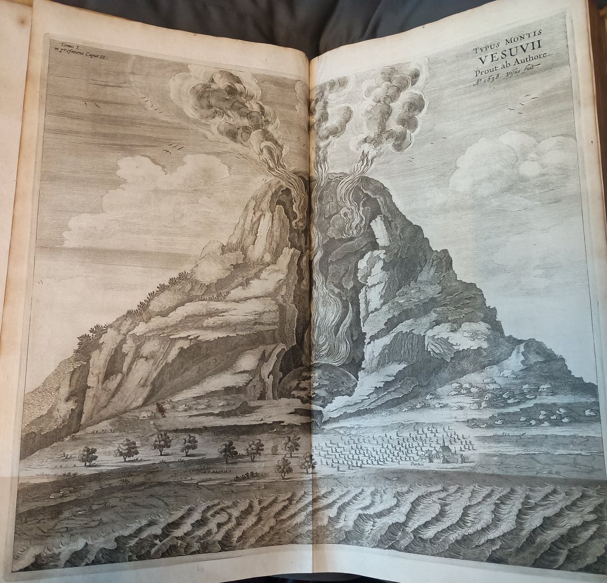 Let the sight of Vesuvius gently erupting in 1638 warm you on this chilly January morning! From Athanasius Kircher's Mundus Subterraneus, printed in 1678.
