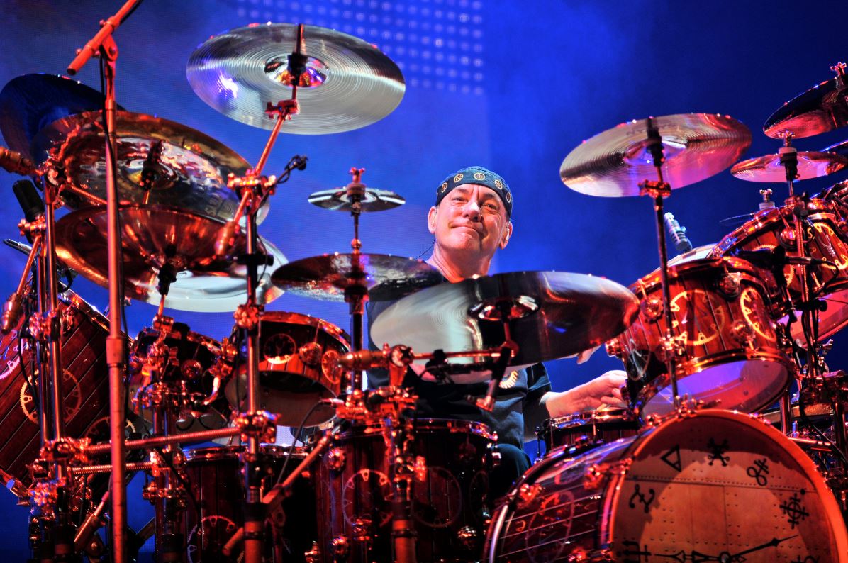 It seems impossible to think about, but Neil Peart died on January 7, 2020. Since then, so many of us have missed him every day. I've always liked this photo, taken by his friend Craig. Neil is smiling, doing what he loved. And we love him &amp; never forget him.