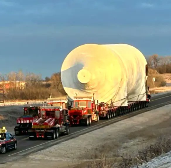 FMExclusives's tweet photo. 🚨 Traffic Alert: Heavy Load on the Move 🚨
Hey #FortMac, heads up! Starting today, a massive coker drum will be making its way from Edmonton to Fort McMurray, and it’s going to take up some serious road space.
Here’s what you need to know:
🕑 Timing: The journey starts early today!
🚛 Speed: Max speed is just 60 km/h, so expect delays.
🚦 Impact: The load will block both directions at times, with flag crews and police managing traffic.
📍 Route:
Stops at the Two Hills scale overnight (Tuesday).
#Boyle overnight (Wednesday).
Final stop in Fort Mac’s staging area (Thursday).
🔍 The Load:
This isn’t your typical delivery. The drum is:
47m long (154 ft)
10.2m high (33 ft)
8.7m wide (28 ft)
Weighing 444,144 kg (979,169 lbs)
🚗 Reminder: Keep an eye out for flag crews, guide vehicles, and closures. Plan your trips accordingly!
Stay safe out there, Fort Mac! 🌍
Article sourced from CTV News!