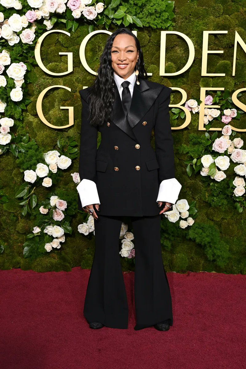 IllumiNative's tweet image. Kali Reis in a oversized black pant suit accented with gold buttons and flared sleeves at the 2025 Golden Globes. 🔥 #NativeRepresentation 
variety.com/gallery/golden…