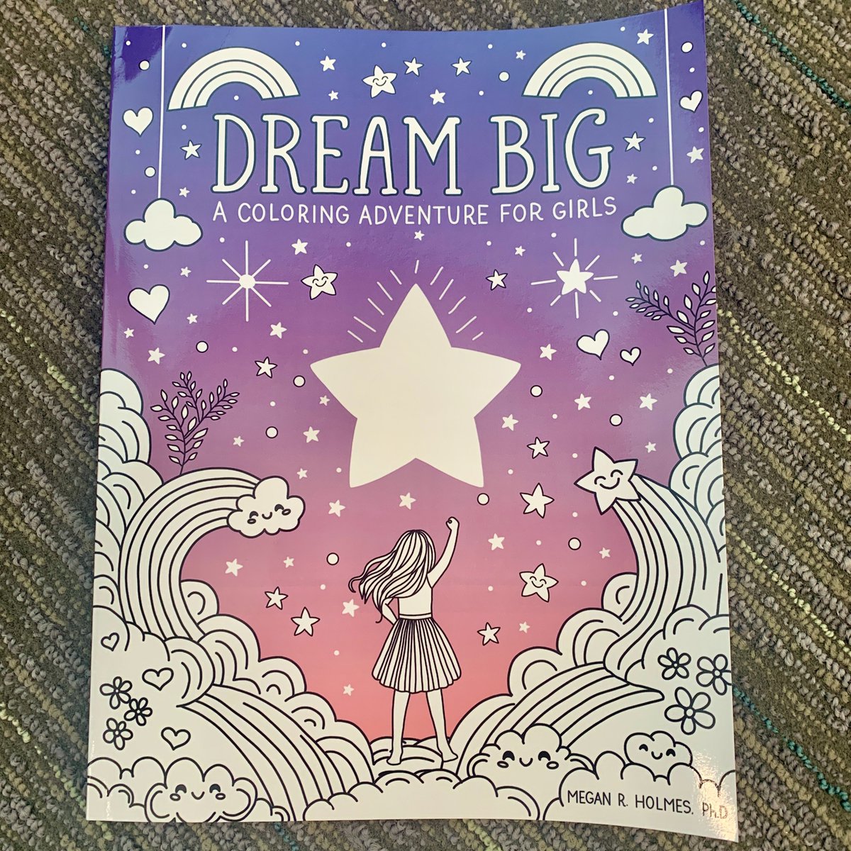 When Professor and Co-Director of the <a href="/CenterOnTrauma/">Center on Trauma and Adversity</a> <a href="/DrMeganHolmes/">Megan R. Holmes, PhD</a> noticed a lack of diversity in children’s coloring books, she decided to make her own. The result was "Dream Big: A Coloring Adventure for Girls," a book celebrating diversity in race, ability and body type.