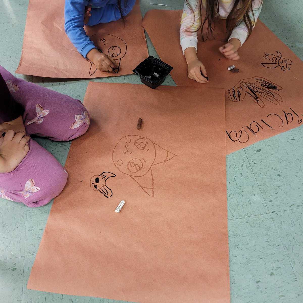 Kinder in their "caves" making their cave art about their favorite things while also learning about neutral colors <a href="/GattisRRISD/">GattisRRISD</a> <a href="/HafedhAzaiez/">Dr. Hafedh Azaiez</a> <a href="/RoundRockISD/">Round Rock ISD</a> <a href="/rrisdfinearts/">Round Rock ISD Fine Arts</a>