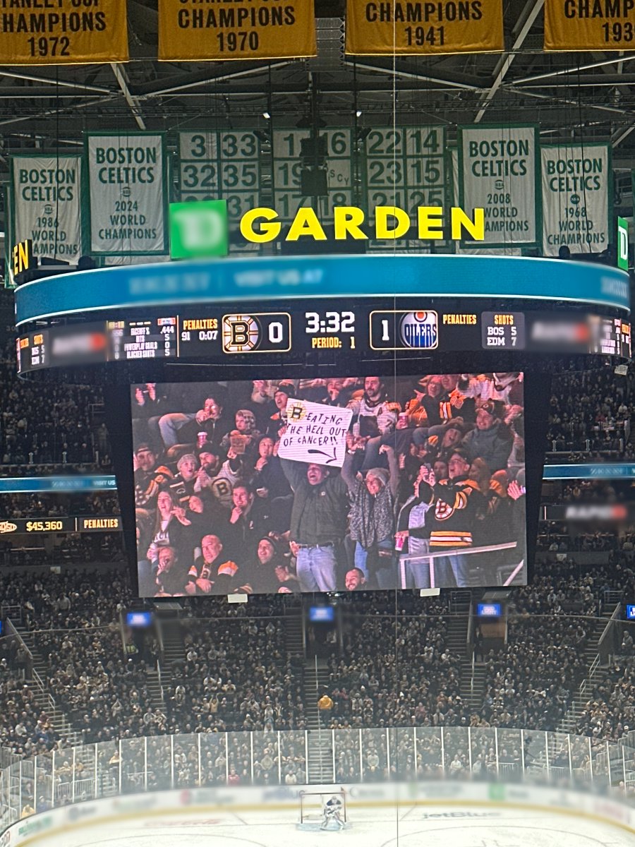 Signs at the Bruins game...

💛