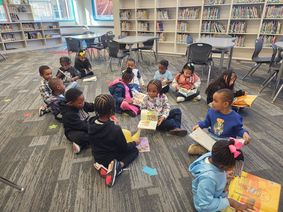 LoudBrarian's tweet image. On the first day back in the library, this kinder little was sooo into reading the pictures in this book.  They were ao happy to share them after they &quot;read&quot; thier book   Librarian Heart Happy #ALLIBRARIES