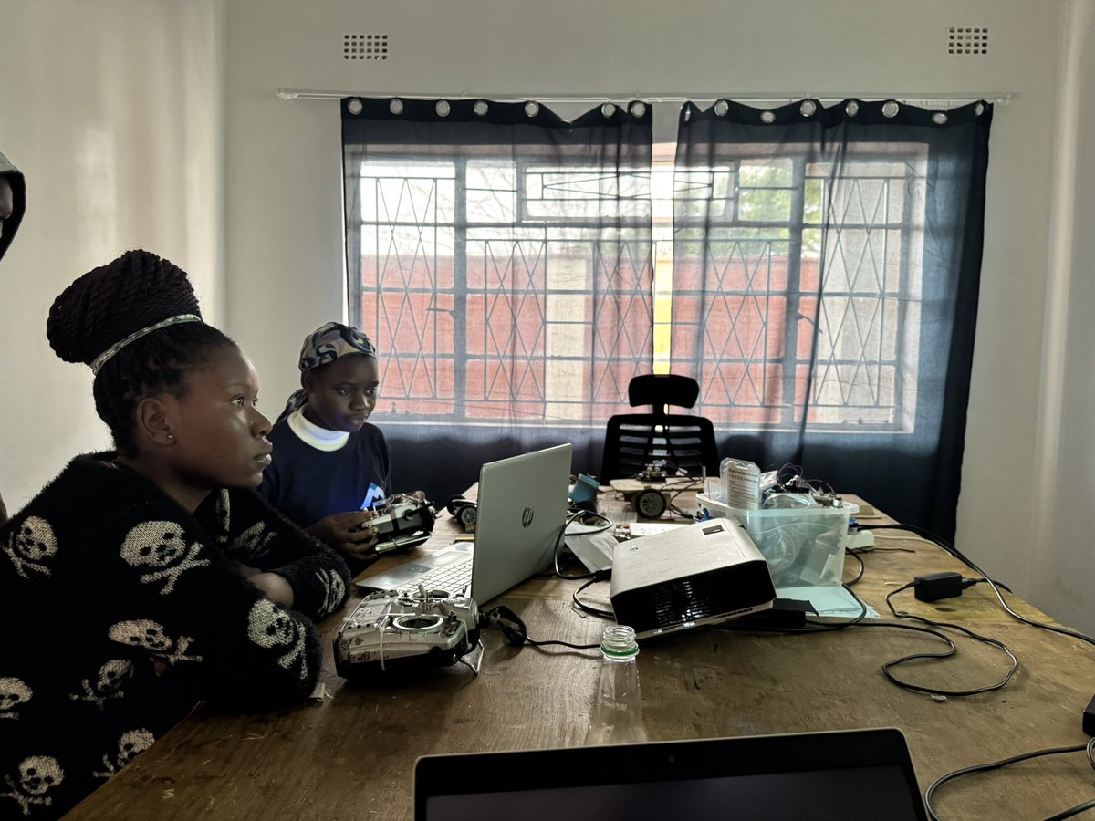 MicroMek_LTD's tweet photo. The weather outside ain’t stopping us from flight! 3 Graduate Girls of MicroMek #Drones4STEM & their instructors take on #Drone piloting simulation training. They intend to use Drones in Agriculture & emergency response. #TheFutureIsUnmanned #ProjectFlyingThings #Drones4Health https://t.co/JrnrtXMtvV