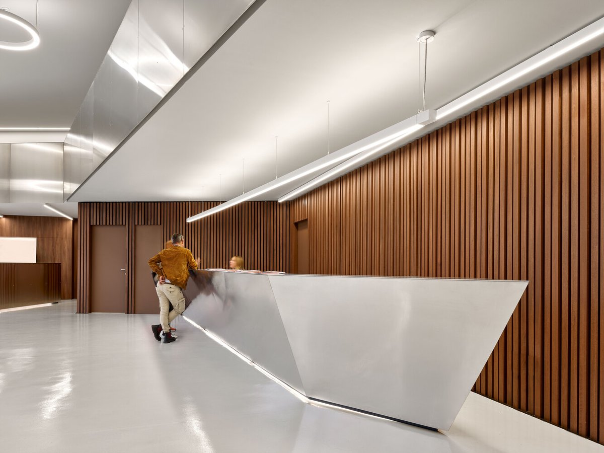 ArchDaily's tweet image. Teatro Bordoni redefines civic #architecture with its rusticated #concrete, aluminum loggias, and glowing translucent #polycarbonate fly tower, integrating cultural and communal spaces while revitalizing the industrial zone with open public areas. ow.ly/tGIy50ULFxG