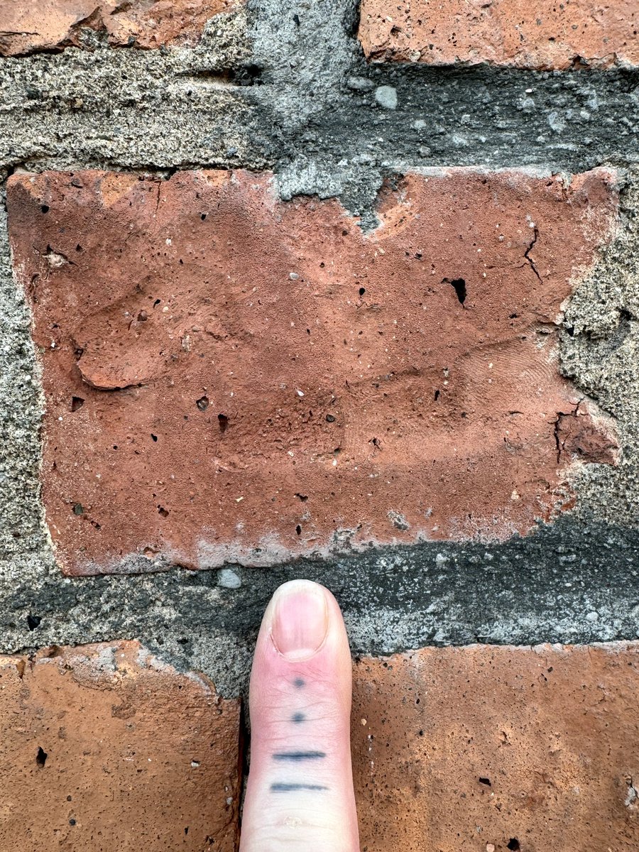 Pretty wild how a worker from the Bothwell Park Brickworks put their finger in this brick, which was destined for Kelvin Hall.. and now, almost 100 years later, some wee goth is stood admiring it
