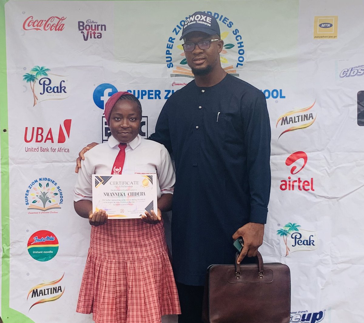 OmuaborSmart's tweet photo. In line with our commitment to giving back to the community, Onoxe Elevation Hub is proud to announce the award of scholarships to pupils of Super Zion scholar’s college Lagos state. https://t.co/VjNXXrCjQt