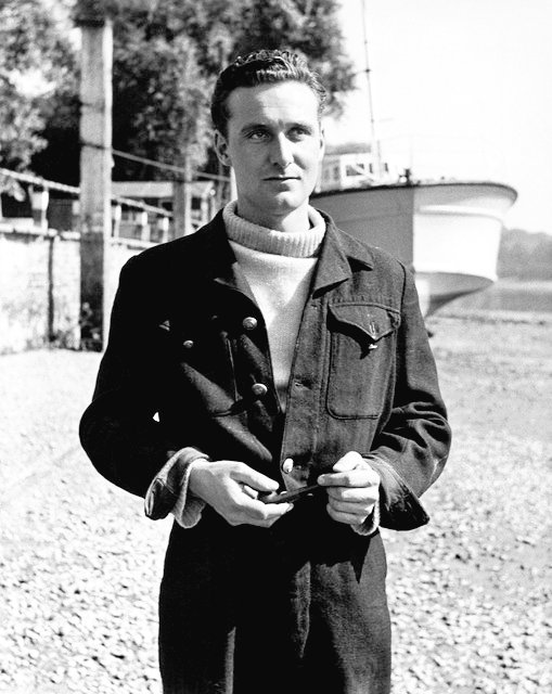 Looking sharp by the shore! Patrick Macnee exudes timeless style in this classic black and white photo. #PatrickMacnee