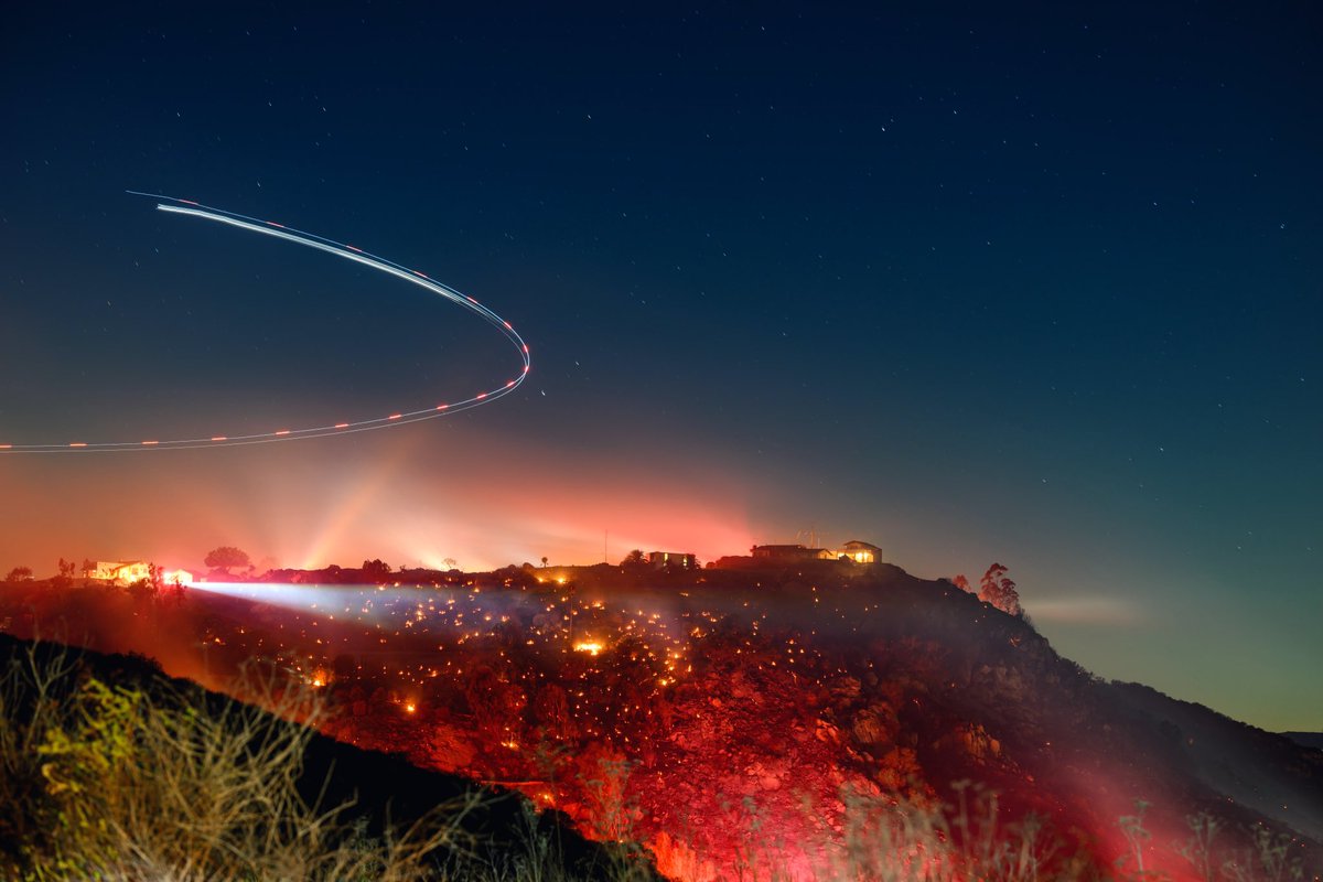 JoshEdelson's tweet photo. In this long exposure photo, a helicopter surveys the scene during the Lilac fire in San Diego County, California early this morning. (Photo by Josh Edelson/AFP)
.
.
.
.
.
#sandiegofire @calfire #lilacfire #redflag #californiafires #longexposure @afpphoto #afpphoto https://t.co/0C2Da0Qo8p