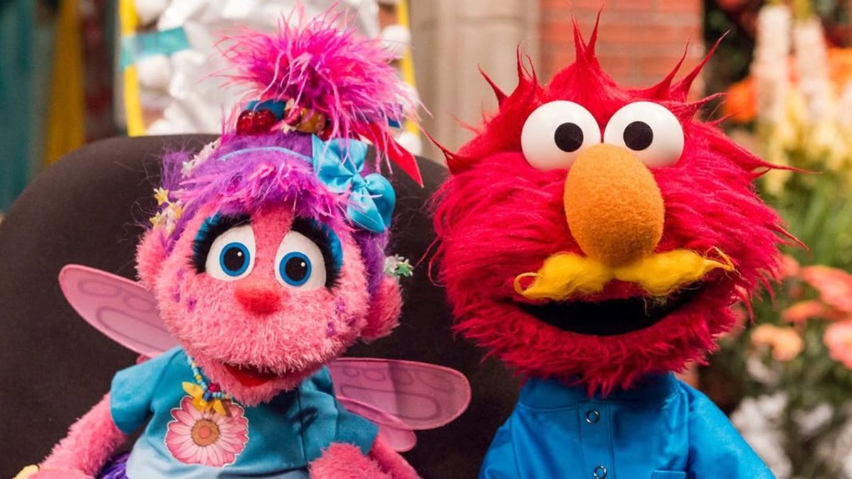 elmo's tweet photo. Elmo mustache you a question but Elmo will shave it for later! Ha ha! https://t.co/dZ3T1Wrqnl