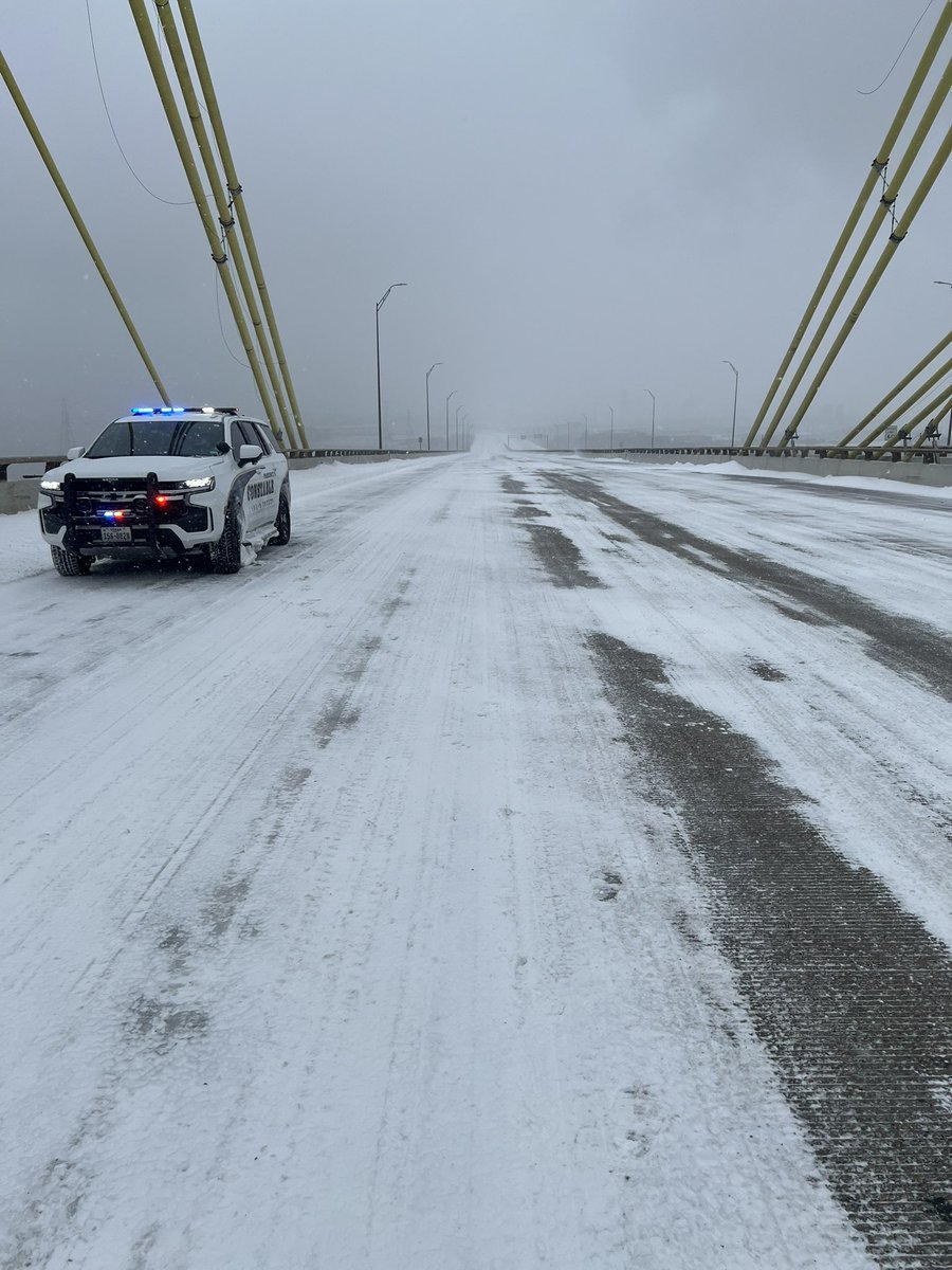 Pct8Constable's tweet photo. Precinct 8 Deputies are continuing to monitor bridges and roadways. The Fred Hartman Bridge and the Ship Channel Toll Bridge are still open at this time but understand closures can occur at any time. 

Please prioritize your safety and stay off the roadways. https://t.co/VolDhRtCxj