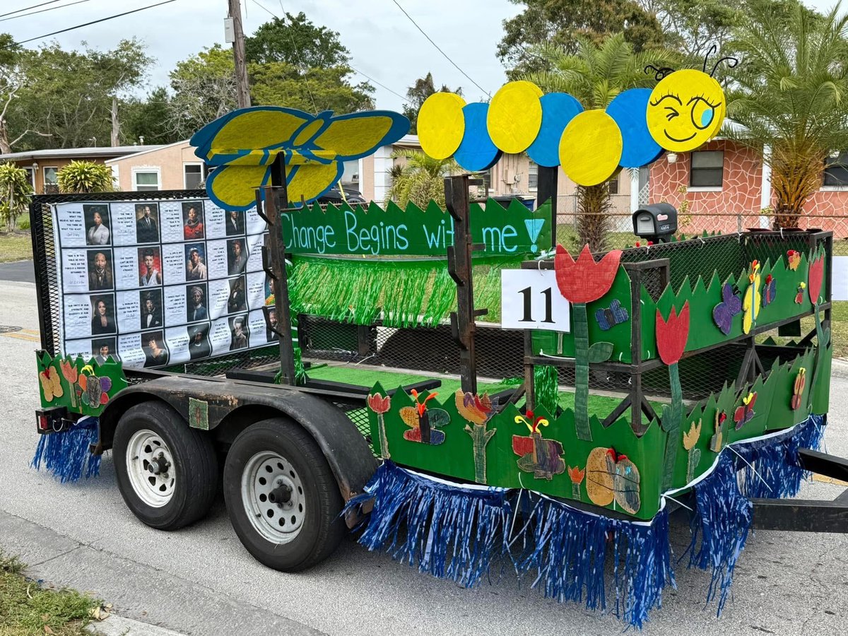 UnitedWaySLO's tweet photo. The #mlkday2025 parade in Ft. Pierce yesterday celebrated “coming together.”  Hundreds lined MLK Blvd  in cold and rainy weather. Our own Community Partnership School team from White City Elementary School participated helping to achieve Dr. King’s vision for all us to be one. https://t.co/N9W8dHVXJR