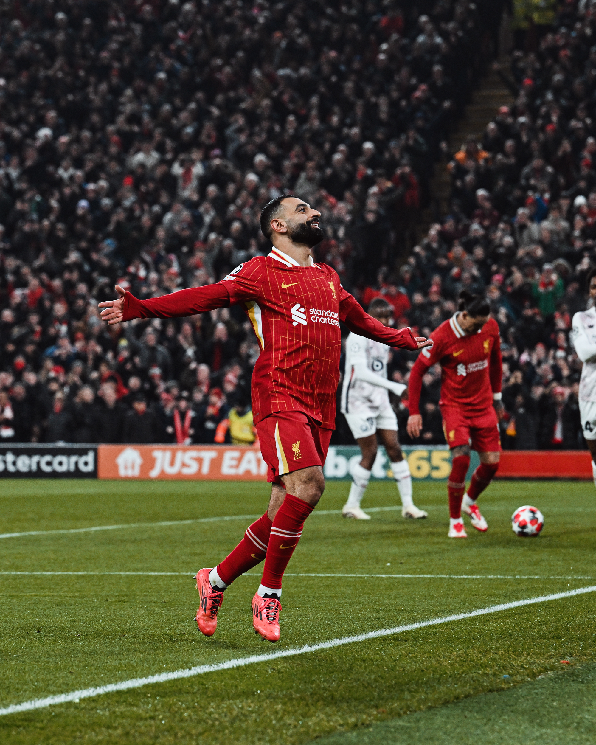 Photography of Mo Salah celebrating his goal against Lille.