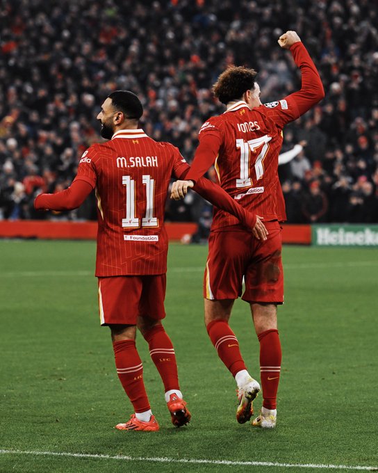 Photography of Mo Salah and Curtis Jones celebrating against Lille.