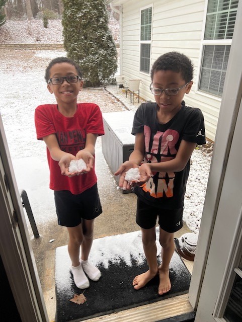 FOX5Atlanta's tweet photo. No shoes needed! From Flowery Branch--Yuri and Rhys Rucker didn't have enough snow to make a snowman, just enough to hold it in your hand. #fox5snow https://t.co/jhFKeQiIKk