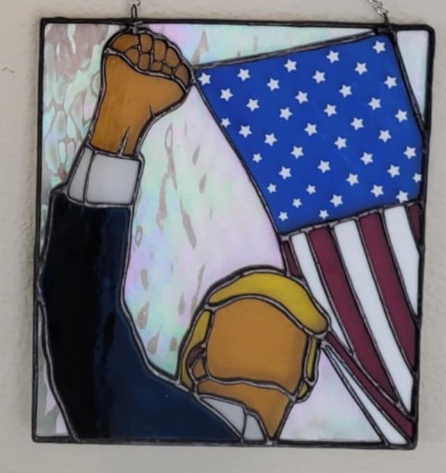 Justice31573877's tweet photo. @realDonaldTrump The best president ever! I had to capture you in stained glass! https://t.co/MmnFnjil4P