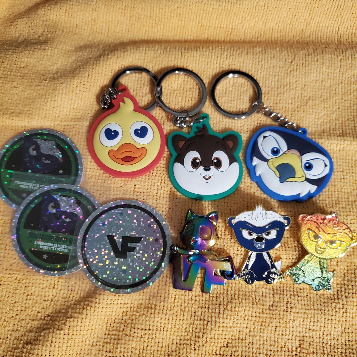 Super sweet mail day!!! Snagged the Honey Badger spot on the <a href="/VeeFriendsCards/">VeeFriends Cards</a> New Year New You stream but couldn't watch. Had no idea we hit the Cat! Kiddos are pumped to rock the key chains to school!! And it's 🌨 in CLT!! Pins and key chains are 🔥 <a href="/veefriends/">VeeFriends</a> <a href="/garyvee/">Gary Vaynerchuk</a> ❤️ 💚