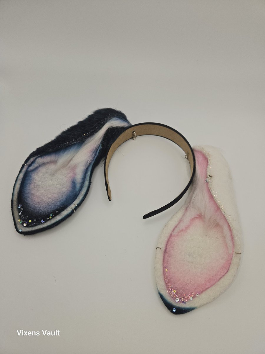 CritterGreaves's tweet photo. ✨🐰 **Magical Lop Bunny Ears Drop!** 🐰✨  
Half-blue, half-white, adorned with butterfly sparkles 🦋 &amp; Swarovski crystals 💎 for ultimate whimsy! Perfect for cosplay, petplay, or kawaii vibes. 💌 Live 5 PM EST, Jan 22! 🌙💙  
https://t.co/jsiySmFdhe  
#VixensVault #PetPlayEars https://t.co/pQneCsLyEY