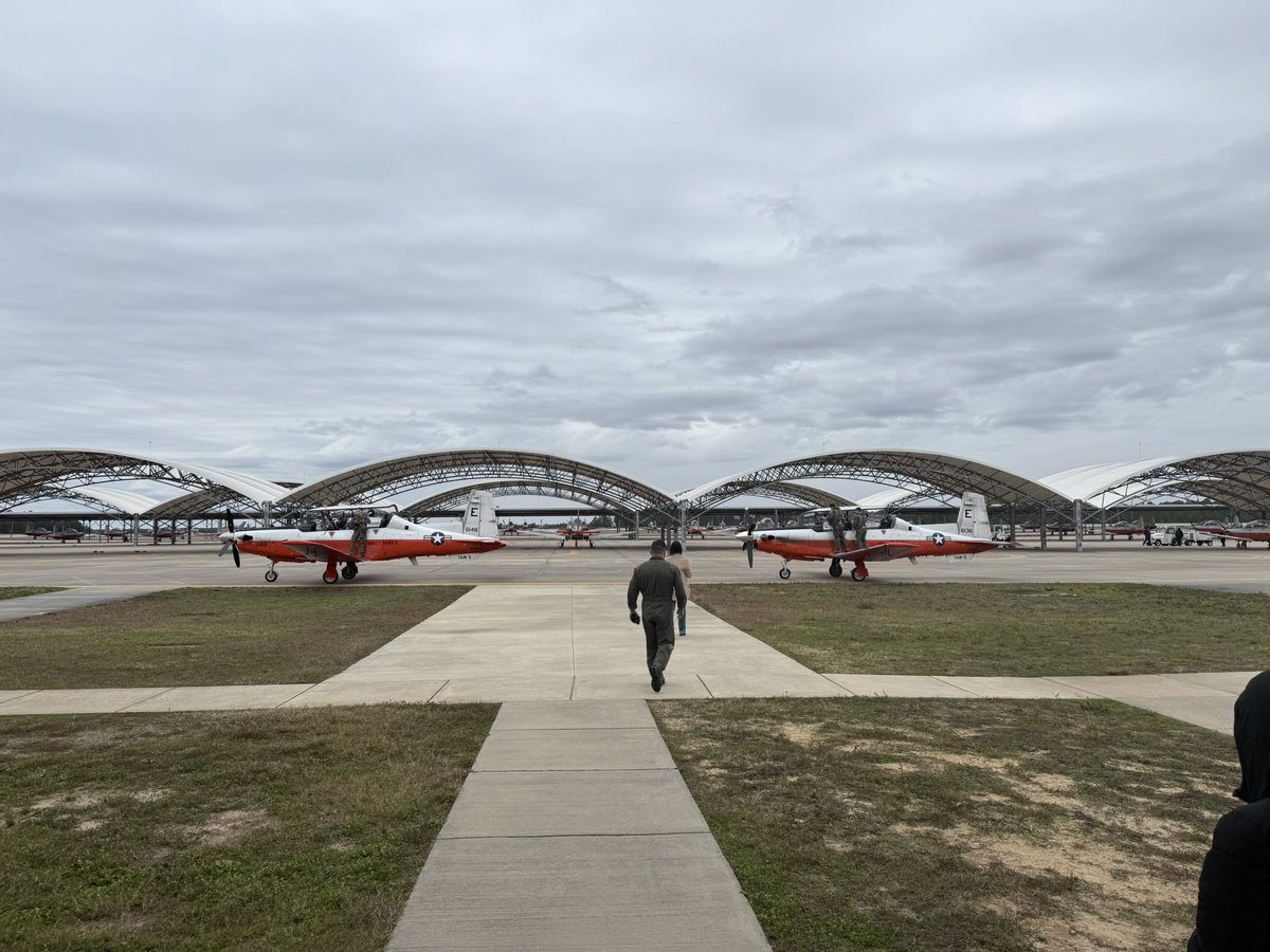 jlushenko's tweet photo. Today, we celebrated the Last Flight for 2 instructors who’ve shaped the next gen of naval aviators. Proud of our team for rising to the challenge &amp; completing student trng before a historic storm shut down ops. Resilience defines Navy Air! @CNATRA @USNavy @flynavy @NASWF https://t.co/y2ZdIYyYo9