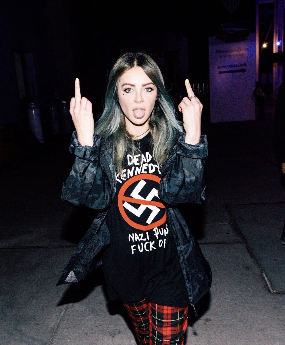 ハードコアパンクバンドDEADKENNEDYSナチパンクFUCKロゴTシャツ My shirt is a “Dead Kennedys” shirt (which is a band .. as I
