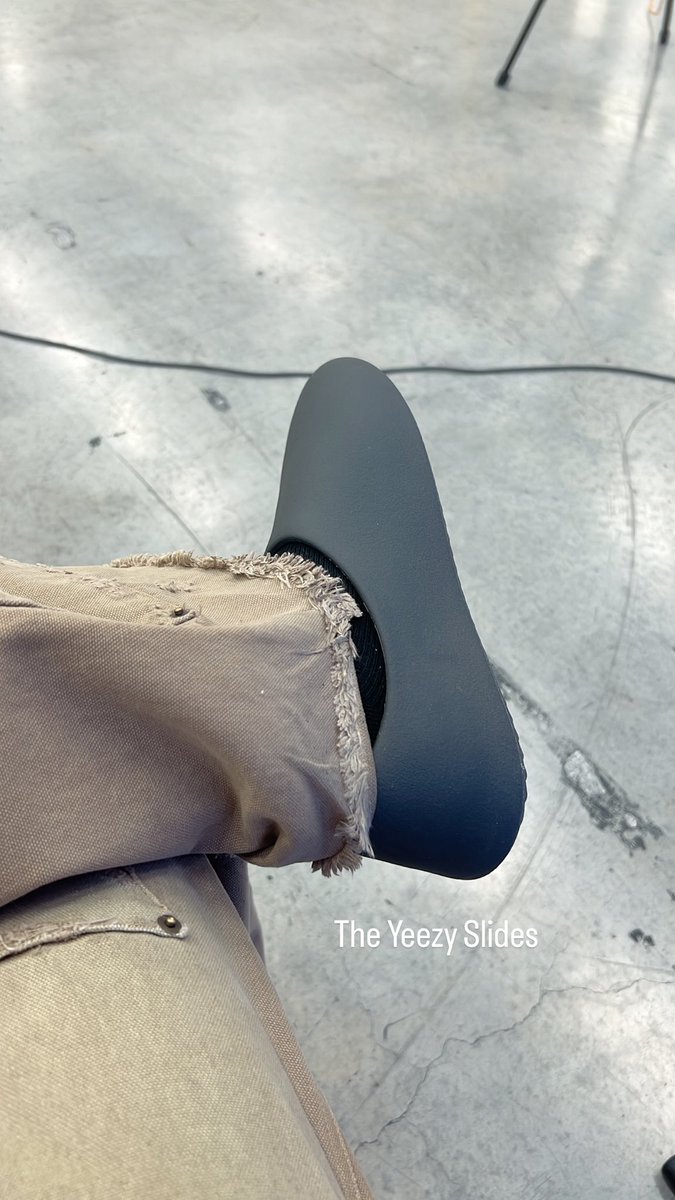 yeezy slides black on feet