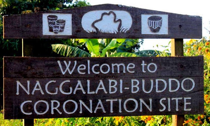 56Tribe's tweet photo. Key Cultural Sites at Naggalabi Coronation Site

Naggalabi is a revered cultural site in Buganda, steeped in traditions that mark the journey of a prince to kingship. Here are the key cultural places and their significance; 

Buganda House
This house is where the prince stays for several days in preparation for kingship. In the past, a king would spend 18 days here during a period called “Enaku z’obwerinde” (days of tension). During this time, all residents abstained from certain activities, including touching a woman, to honor the sacred process.

Bwanika House
The prince undergoes sacred rituals in this house, but before entering, he takes a cleansing ritual bath called “Akogero.” This act symbolizes purification and readiness for leadership.

Magato
At this spot, the prince is fitted with traditional sandals, a symbolic gesture that his feet are ready to undertake the duties of a king.

Nakibuuka
Further rituals are performed here, culminating in the prince being crowned and officially declared the king of Buganda.

Mboneredde Tree
This ancient tree is a treasured symbol of Buganda’s history. It is said that Kabaka Kintu, Buganda’s first king, used it as his court. People proven guilty during court sessions would plead for forgiveness under its shade, saying “Mboneredde” (I have learned my lesson), giving the tree its iconic name.

#tribe56