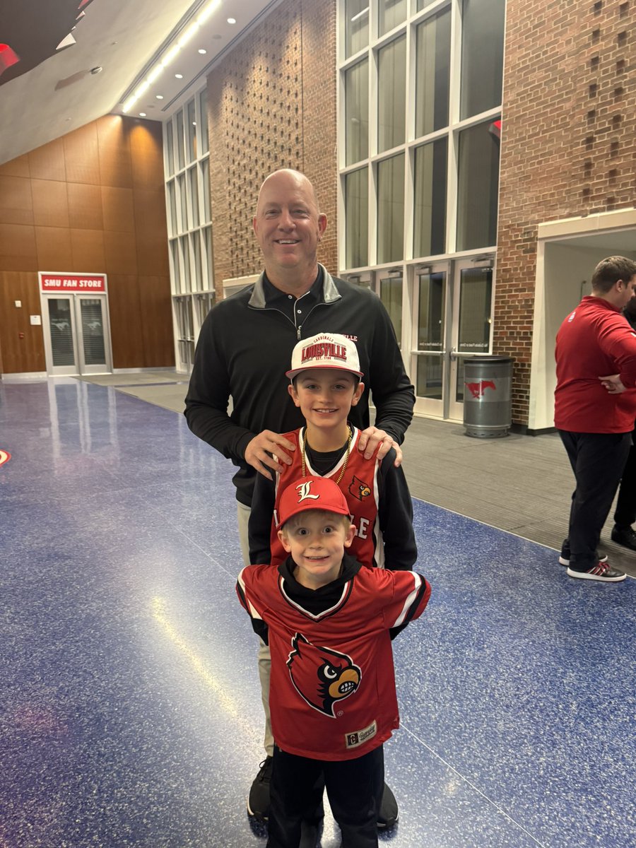 JenClarky's tweet photo. @jlightsy7 We were at the game (part of that Cards chant) and it was flooded with fans. I kept searching twitter to see if anyone was commenting on how loud the Louisville fans were during the game. Was pretty awesome to see. Plus my boys got a picture with Coach Brohm after the game! https://t.co/4rywwdBWot