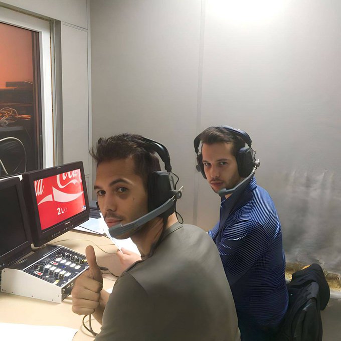 2 billionaires looking at the third one.