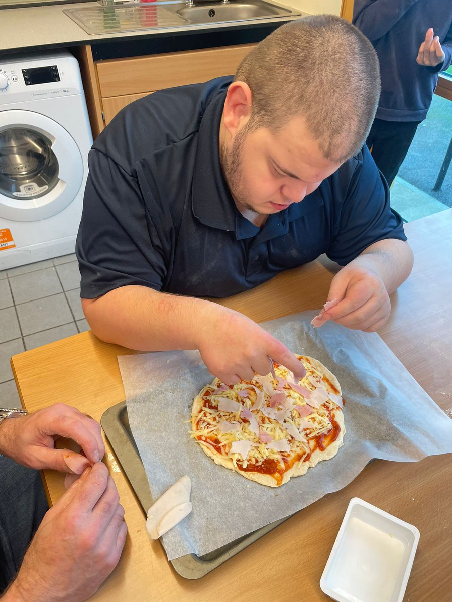 5SM had a great time making pizza's during cooking.