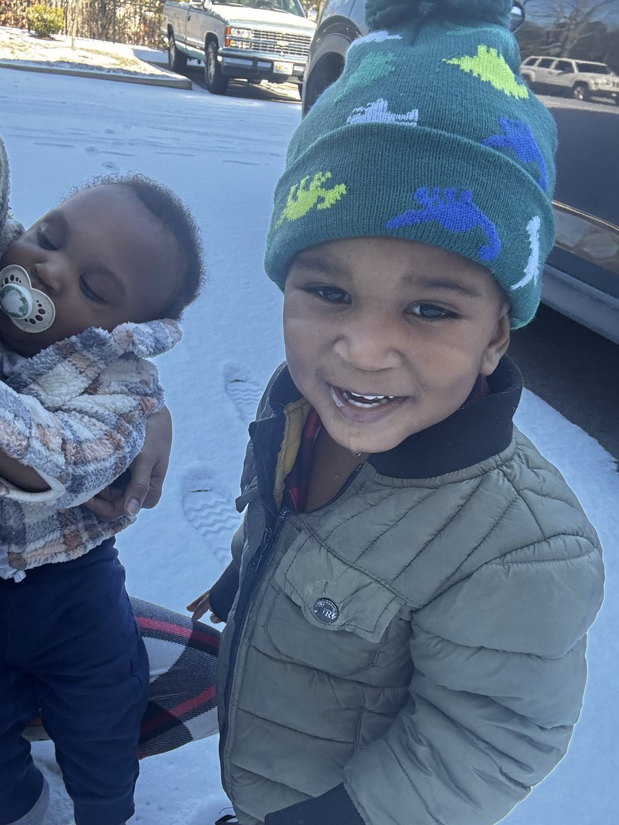 One of Ms. Scott’s sons is living his best snow day life. The other is sleeping right through it! LOL #CreekLife <a href="/DurhamPublicSch/">Durham Public Schools</a>