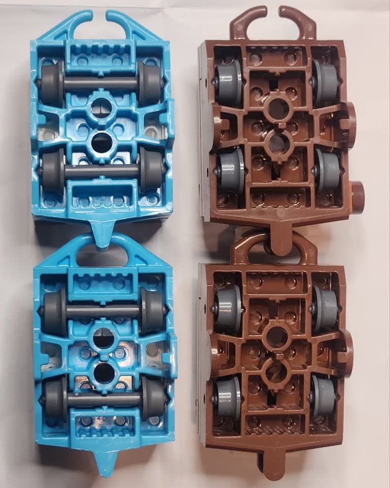 Coaster101's tweet photo. It's #wheelassemblywednesday, can you guess which of these coaster cars are official LEGO and which ones are not? Which one do you think rolls along the track better? https://t.co/03cBOEJ4uV