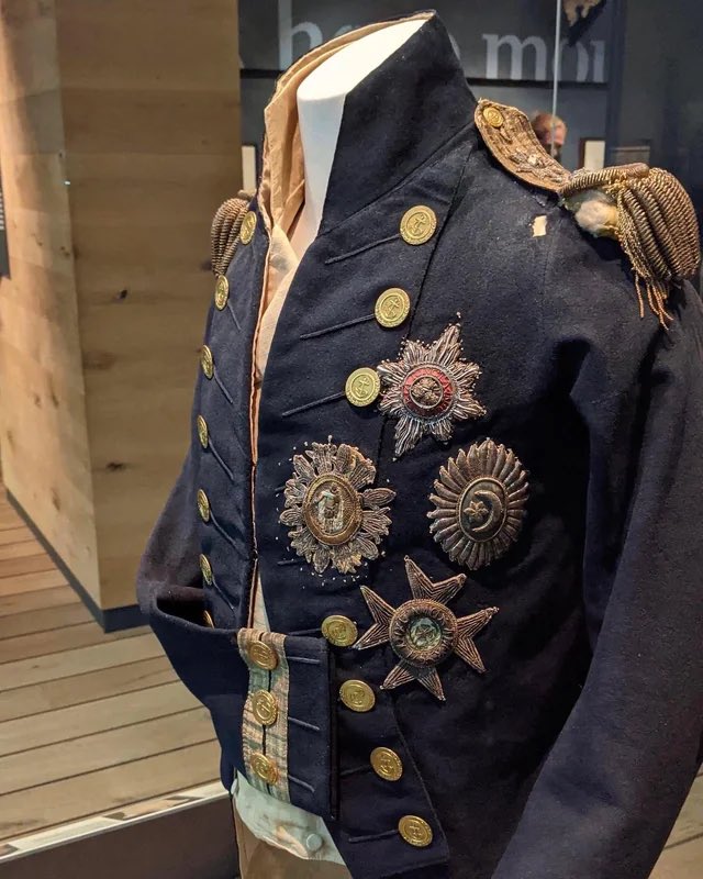 The coat worn by the British admiral Horatio Nelson at the Battle of Trafalgar in 1805 with the hole in the left shoulder caused by the musket ball that kiIIed him.