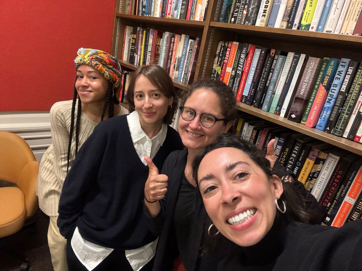 nypl's tweet image. Need a pick-me-up? It's #LibraryShelfieDay! NYPL staff are sharing some library joy posing in front of their favorite bookshelves. Snap a photo of yourself in front of your bookshelf at home or at your local library 🤳