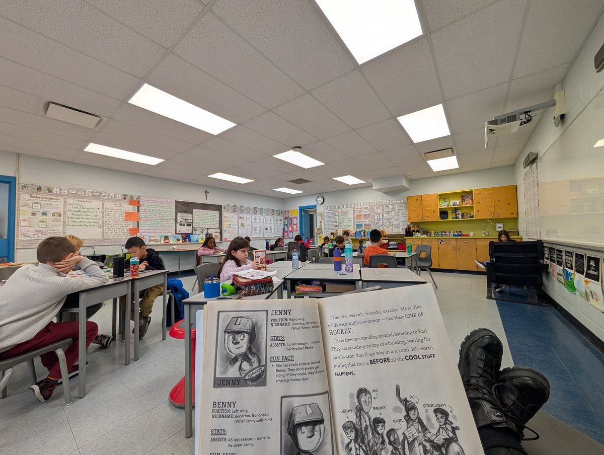 Reading together and chatting about our books. I'm reading a student recommendation. It's pretty good.